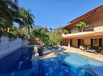 Casa · 907m² · 10 Vagas · Venha se encantar com esta magnífica residência à venda no Condomínio GreenWood Park, localizado no…