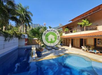 Casa · 907m² · 10 Vagas · Venha se encantar com esta magnífica residência à venda no Condomínio GreenWood Park, localizado no…