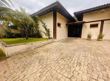 Foto 02 · Belíssima casa em condomínio com 4 suítes, varanda com espaço gourmet e piscina, na praia Dura em Ub
