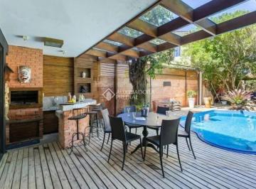 Casa · 390m² · 5 Quartos · 4 Vagas · Auxiliadora Predial aluga Casa com 390 m² de área privativa, com 5 dormitórios sendo 1 suíte no bair