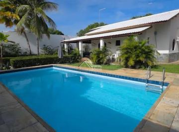 whatsapp-image-2026-05-26-at-14-44-331779829172558.jpeg · Casa de alto padrão em Guarajuba com 370m², piscina privativa, acesso exclusivo à praia Bandeira Azu