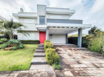 Casa · 308m² · 5 Quartos · 2 Vagas · ALPHAVILLE PORTO ALEGRE | CASA COM FUNDOS PARA APP E ÁREA EXTERNA COMPLETA