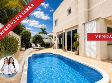 Casa · 313m² · 3 Quartos · 4 Vagas · Condomínio Reserva da Serra - Casa Alto Padrão com Pé-Direito Duplo, Piscina e Paisagismo no Reserva