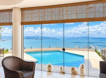 tvwgk02ytmwnwzmmwe0mwzj_md · Casa vista mar privilegiada em localização nobre de Florianópolis.