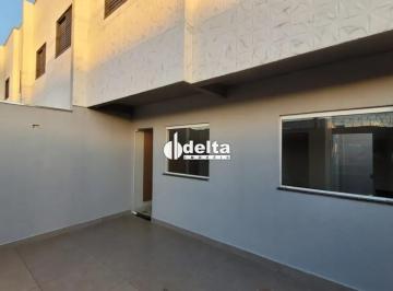 Casa · 73m² · 2 Quartos · 2 Vagas · Casa residencial com 2 suítes disponível para locação e venda no bairro Novo Mundo em Uberlândia-MG