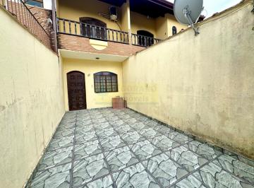 Foto 01 · Sobrado à venda na Prainha, Caraguatatuba-SP: Refúgio à beira-mar com 2 suítes, sala ampla e vista p