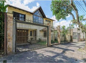 Casa · 357m² · 3 Quartos · 4 Vagas · Casa com 3 quartos e 357m² à venda em Tristeza, Porto Alegre.