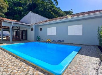 e73291da86bdab4f2fa5c95de14297f6ef9f0ca5 · Casa com Piscina,  6 dormitórios à venda, 290 m² por R$ 900.000 - Centro - Guaratuba/PR