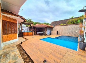 1217fd81af3fc41befb9d2dc04bc9684c1256c61 · Casa térrea em condomínio fechado na região da praia de Pernambuco no Guarujá!