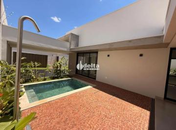 Comercial · 400m² · 3 Quartos · 4 Vagas · Casa com 3 suítes disponível para venda no bairro Jardim Karaíba em Uberlândia?MG