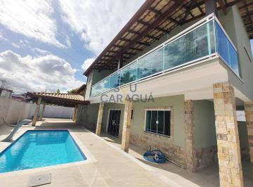 Casa · 207m² · 3 Quartos · 6 Vagas · Casa com piscina e 03 dormitórios, sendo 02 suítes em Caraguatatuba