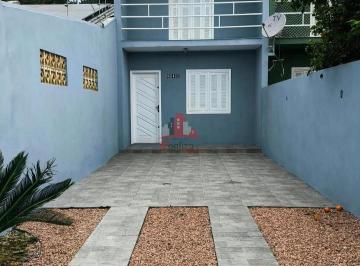 Casa · 100m² · 2 Quartos · 2 Vagas · Venda de sobrado com 2 dormitórios e pátio privativo no bairro Pasqualini