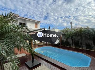 Casa · 220m² · 3 Quartos · 3 Vagas · Casa com Piscina Aquecida e Energia Solar