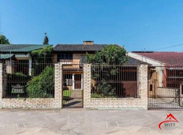 Casa · 230m² · 3 Quartos · 3 Vagas · Residência no bairro Camaquã, com 3 dormitório(s), e 3 banheiros,