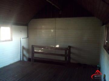 Casa · 600m² · 2 Quartos · 2 Vagas · Casa de madeira à venda no Loteamento Tarumã, em Viamão.