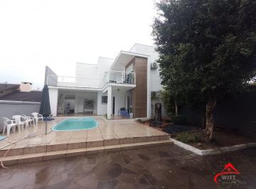 Casa · 328m² · 5 Quartos · 4 Vagas · Casa de 5 dormitórios, piscina e 4 vagas de garagem em Canoas.