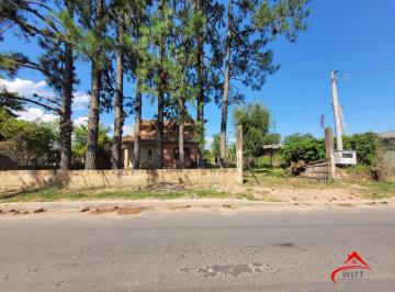 .jpg+2025-05-30 · Ótimo terreno com casa na Ponta Grossa.