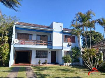 Casa · 237m² · 3 Quartos · 2 Vagas · Casa com 3 dormitótrios, piscina e 2 vagas de garagem em Canoas.