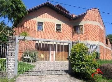 .jpg+2025-03-05 · Casa em Porto Alegre, no bairro Jardim Isabel, com 4 dormitório(s), à venda.