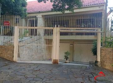 Frente+Casa.jpg+2025-04-10 · Casa 3 dormitórios à venda Santo Antônio Porto Alegre/RS