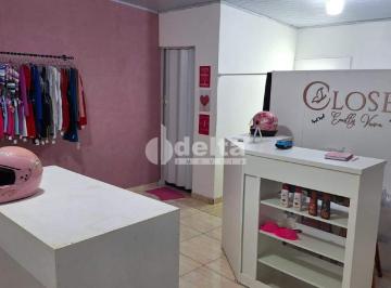 NULL · Casa residencial disponível para venda no bairro Residencial Pequis em Uberlândia-MG