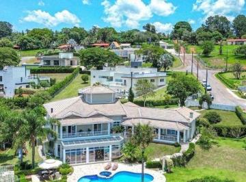 fdfbebad01afb614fc72c00e1b73c17862f1c36d · Casa com 6 dormitórios à venda, 589 m² por R$ 4.950.000,00 - Condomínio Jardim das Palmeiras - Braga