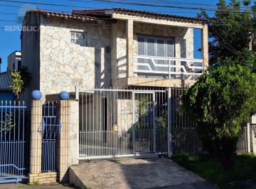 Casa · 200m² · 3 Quartos · 2 Vagas · Casa com 3 dormitórios, suíte, lareira, Jardim Algarve em Alvorada - RS.