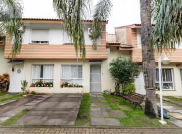 Frente · Casa de condomínio com 150m², 3 quartos e 2 vagas