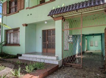 Casa · 253m² · 5 Quartos · 4 Vagas · Casa sobrado no Partenon com 5 dormitórios e 4 vagas