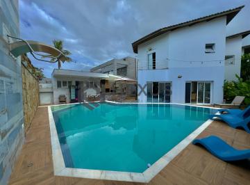 Foto · Casa reformada com piscina e área gourmet no Condomínio Jardim Acapulco, Guaruja