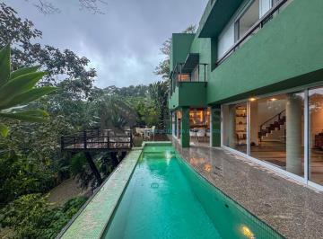 Foto · Casa de praia com piscina e churrasqueira no Sítio São Pedro, Guaruja