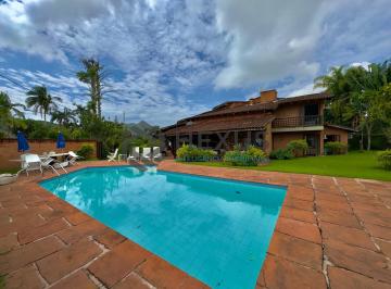 Foto · Casa Rústica com piscina e área gourmet no Jardim Acapulco, Guaruja