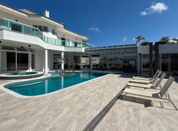 Foto · Casa de alto padrão com varanda piscina e lazer no Jardim Acapulco, Guarujá