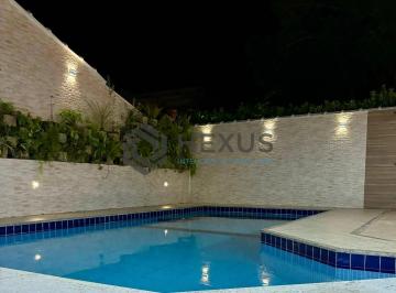 Foto · Casa reformado com varanda piscina e área gourmet no Jardim Albamar, Guarujá