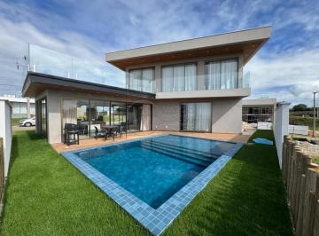 Casa · 469m² · 4 Quartos · 2 Vagas · Casa com 4 Suítes e Piscina com área gourmet e Rooftop à venda no Cond Reserva Porangatu