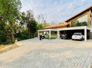 09861886bb5f480470413643d77d3c2b1501e4ae · Belíssima casa térrea no Condomínio Panorama com 4 Suítes com 378m²de área construída e muita privac