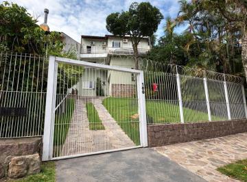 Casa · 370m² · 7 Quartos · 4 Vagas · Casa de 6 quartos com vista panorâmica para o Guaíba