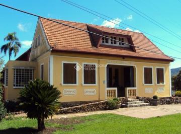 1 · área comercial e residencial com casa antiga e casa moderna já anexada em Nova Petrópolis