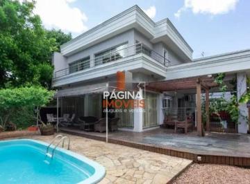 Casa · 400m² · 4 Quartos · 2 Vagas · Página 1 Imóveis anuncia para venda linda casa de esquina com 04 dormitórios mobiliado, no bairro Ig