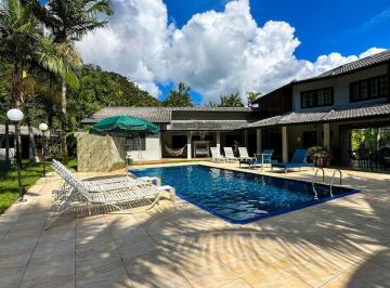Casa · 334m² · 4 Quartos · 6 Vagas · Marina Guarujá, casa à venda na área seca com pier para barco no flutuante.