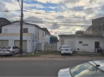 Comercial · Oportunidade Única – Terreno Amplo com Galpões Comerciais e Moradias em Local Estratégico!
