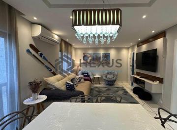Foto · Apartamento reformado com varanda gourmet vista mar e lazer a 500m da praia na E