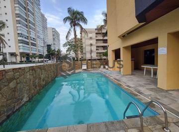 Foto · Cobertura duplex reformada com varanda vista mar e lazer na Praia da Enseada, Gu