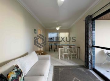 Foto · Apartamento com varanda e vista mar em prédio com lazer a uma quadra da Praia da