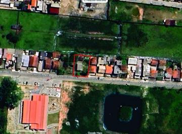 1215082ba8316705b636ec8c968d49.jpeg · Terreno no Bairro praça, com casa de madeira.