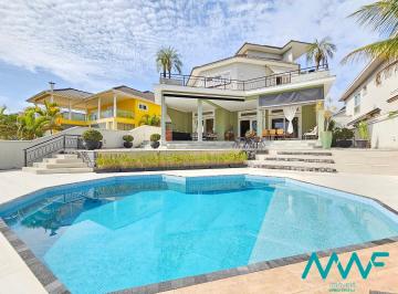 Casa · 765m² · 4 Quartos · 6 Vagas · Cond. Melville: Imponência, Lazer Exclusivo e Vista Definitiva