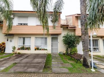 Frente · Casa de condomínio com 150m², 3 quartos e 2 vagas