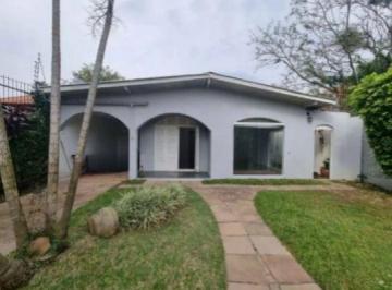 Casa · 435m² · 3 Quartos · 5 Vagas · Casa 3 Dormitórios com Piscina à Venda no Guarujá – Zona Sul de Porto Alegre