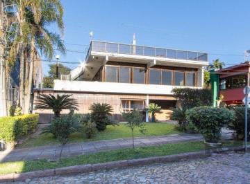 Casa · 375m² · 3 Quartos · 4 Vagas · Casa em condomínio que possui 3 dormitórios, sendo 1suíte, lavabo, escritório, p