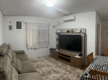 Apartamento · 61m² · 2 Quartos · Apartamento de 2 dormitórios, living, cozinha, área de serviço e banheiro social.